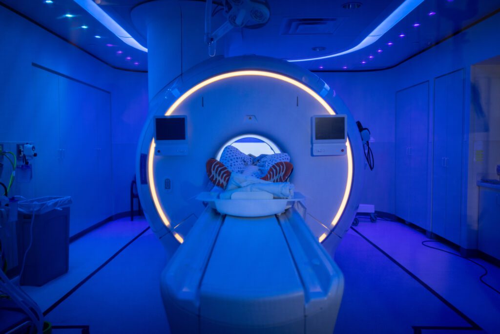 A patient receives and MRI scan at Phoenix Children's. The room is blue colored. 