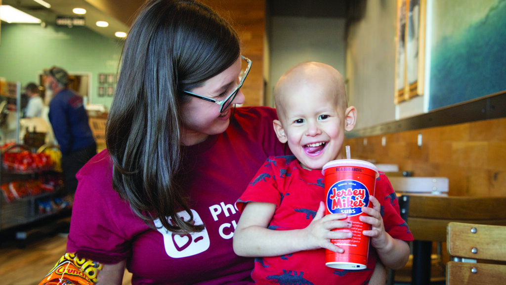 A Phoenix Children's patient and his mother eat at Jersey Mike's.