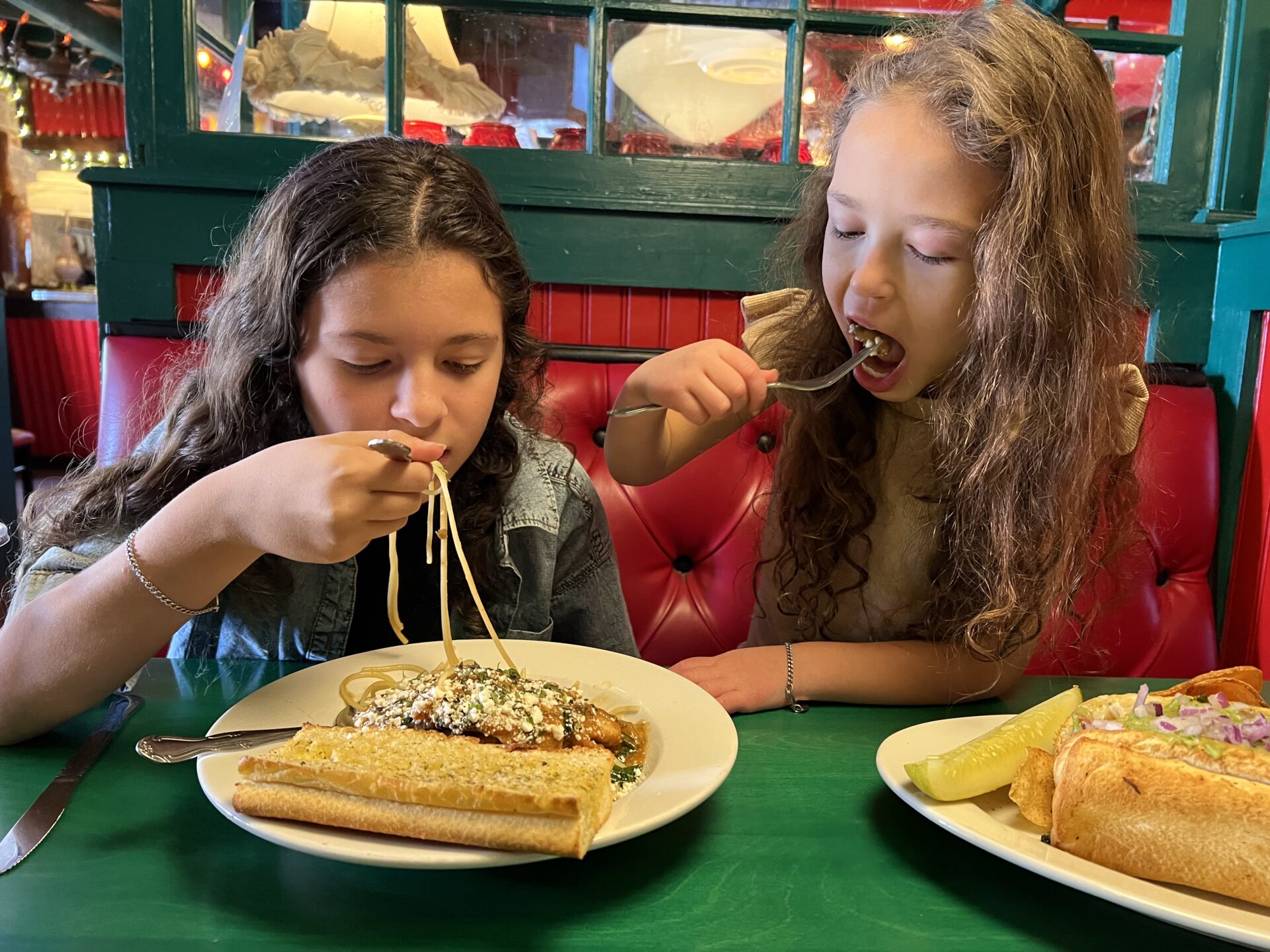 Two Phoenix Children's patients enjoy a meal at Oregano's