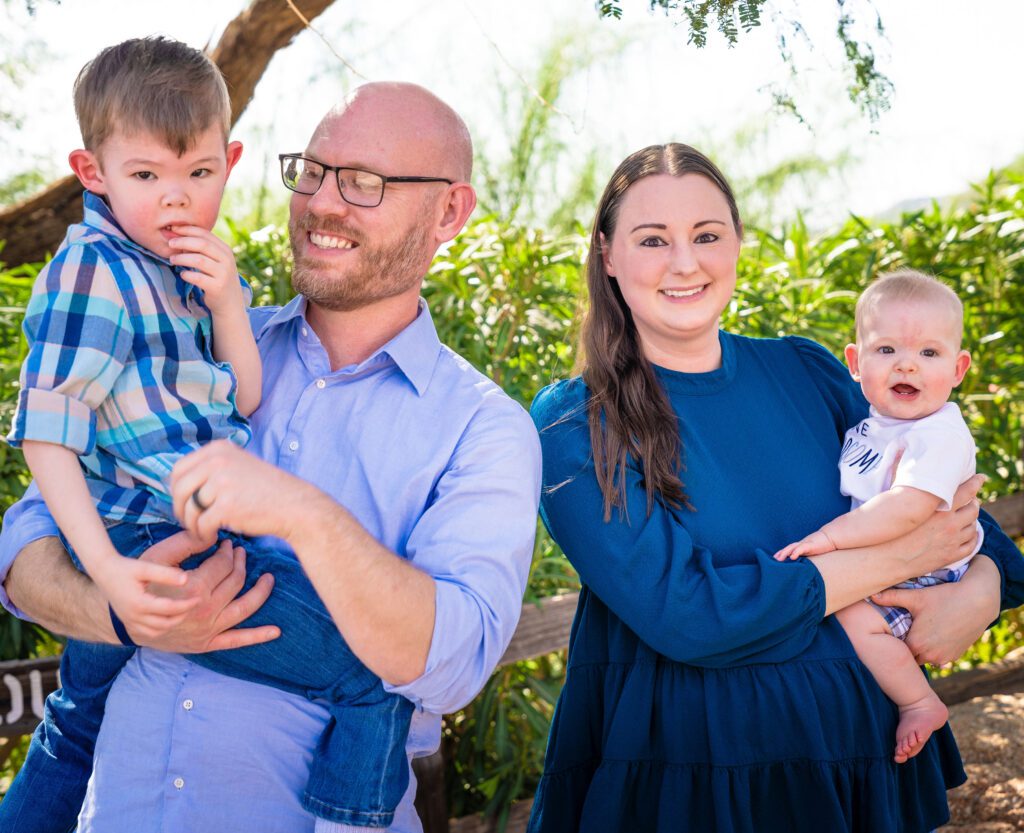 Jackson, Phoenix Children's Patient Ambassador, with his parents and younger brother.