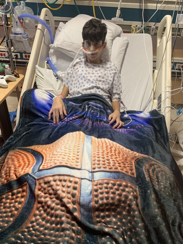 Calvin in his hospital bed at Phoenix Children's.