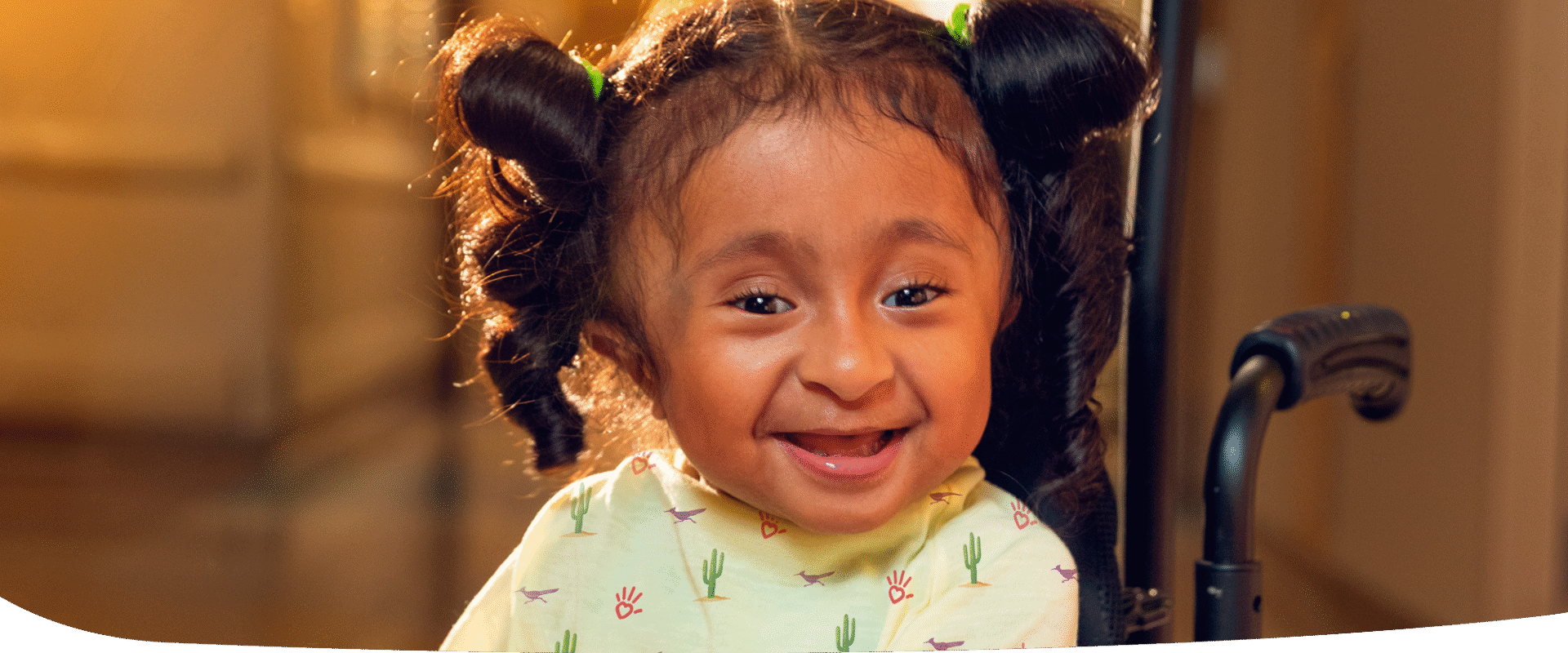 Smiling girl petting dog.
