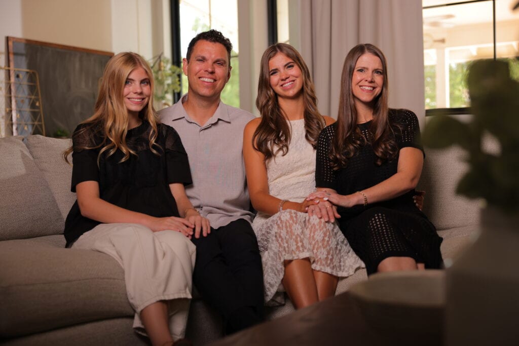 Charlotte Gould with her parents and sister.