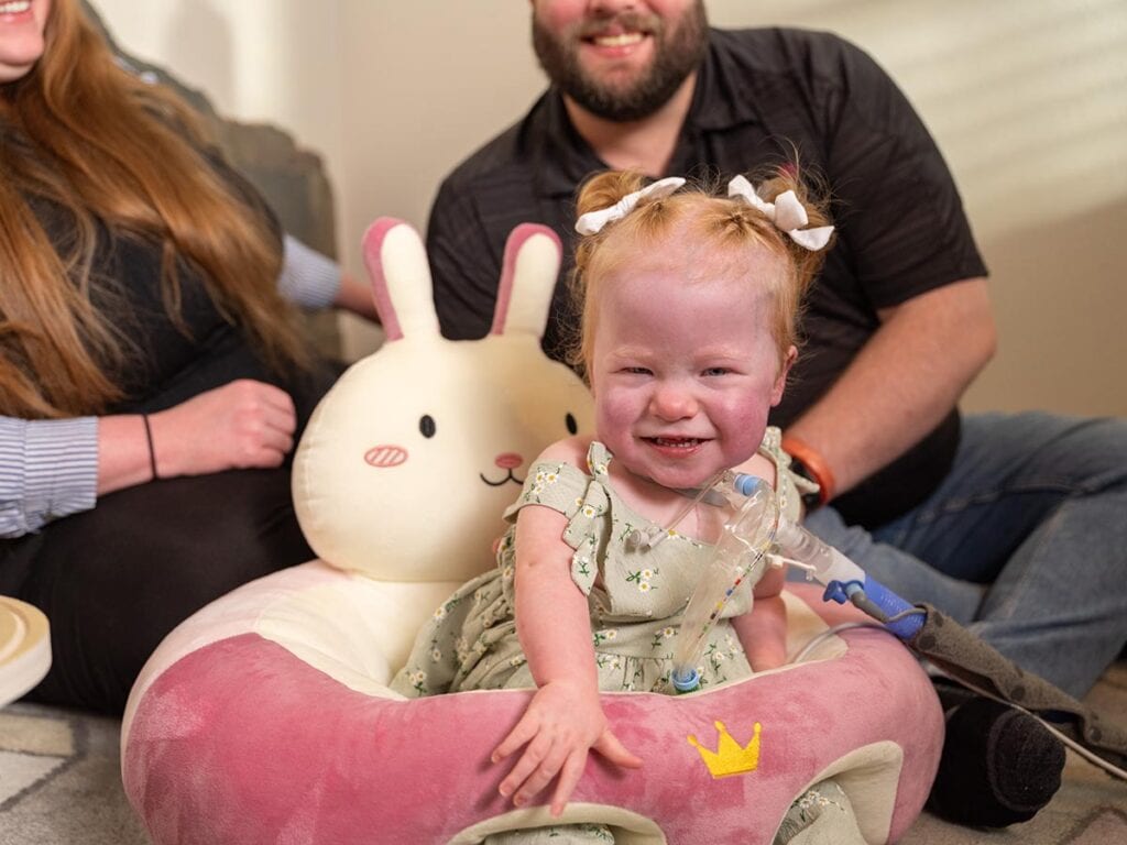 Rose with her parents.